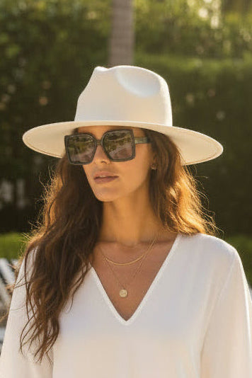 White straw hat on a white background